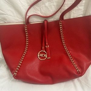 Red/white BCBG reversible bag.